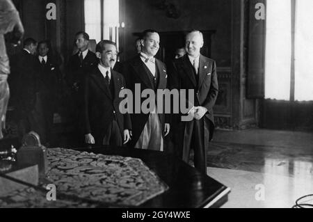 On November 6, 1937, Fascist Italy joined the Anti-Comintern Pact that Germany and Japan had signed the year before. On the morning of November 6, diplomats gathered for the signing of the accession in Palazzo Chigi (then the seat of the Italian Foreign Ministry) in the center of Rome (from left to right): Hotta Masaaki, Japan's ambassador to Italy, Count Gian Galeazzo Ciano, Italian foreign minister, and Joachim von Ribbentrop, then German ambassador in London, here in the capacity of ambassador extraordinary and plenipotentiary for Germany. [automated translation] Stock Photo