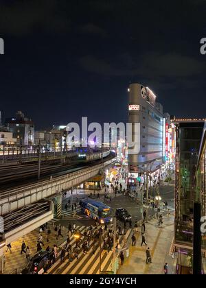 Tokyo, Japan - 18 November 2019: High angle night view of the Ueno Park street leading to the intersection of the Central Street and Ameyoko Street in Stock Photo