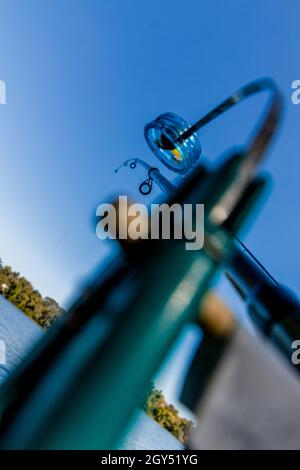 Spinning rod for catching large fish in full length close-up. Fishing. Stock Photo