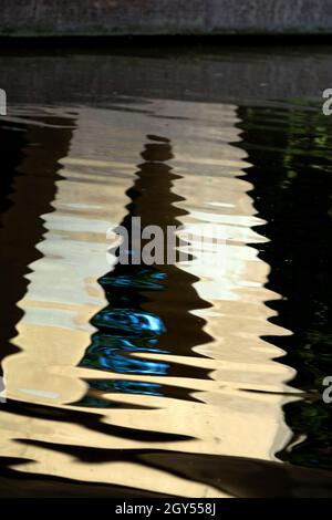 Reflection of a concrete bridge support in the Grand Union Canal, Warwick, Warwickshire, UK Stock Photo