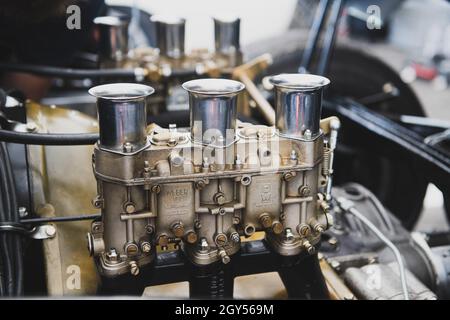 Italy, september 11 2021. Vallelunga classic. Vintage shiny race car engine close up selective focus Stock Photo