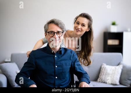 Smiling Older Man Care By Medical Nurse Stock Photo
