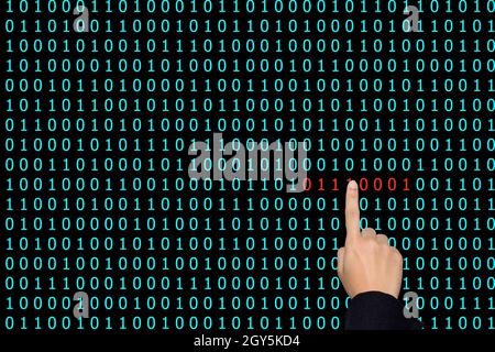 Businesswoman are pointing binary code problems. Stock Photo