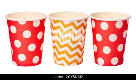 Paper disposable cups with colored pattern isolated on white background Stock Photo