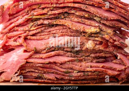 stack of sliced pastrami meat Stock Photo
