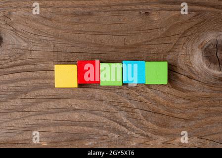 Stack of Sample Cube Rectangular Boxes On Surface Polished With Multi-Colour Stock Photo