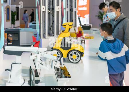 CHONGQING, CHINA - May 23, 2021: the Different type of robots displayed at China smart expo Stock Photo