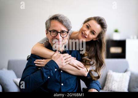 Smiling Older Man Care By Medical Nurse Stock Photo