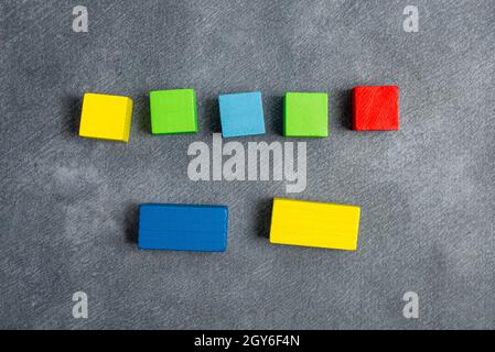 Stack of Sample Cube Rectangular Boxes On Surface Polished With Multi-Colour Stock Photo