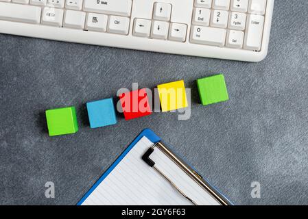 Stack of Sample Cube Rectangular Boxes On Surface Polished With Multi-Colour Stock Photo