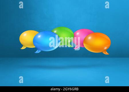 3D multicolor speech bubbles isolated on blue background Stock Photo