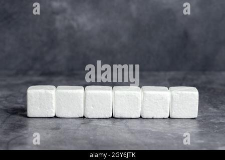 Stack of Sample Cube Rectangular Boxes On Surface Polished With Multi-Colour Stock Photo