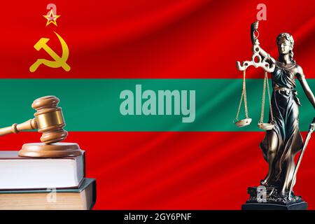 Law and justice in Transnistria. Statue of themis and the gavel of the judge against the background of the flag of Transnistria. Law and justice conce Stock Photo