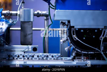 Production of the bottles plastic The Technological line on production of the plastic bottles. Conveyor automatic. Stock Photo