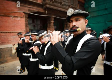 Bhaktapur, Bagmati, Nepal. 7th Oct, 2021. Nepalese Army Personnels of Gurujuko Paltan plays traditional instruments during Ghatasthapana, first day of Dashain Festival at Basantapur Durbar Square, Kathmandu.Oct 7 2021 The biggest religious festival of Hindus in Nepal. Credit: Amit Machamasi/ZUMA Wire/Alamy Live News Stock Photo