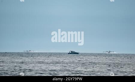 two water airplanes landing near to boat Stock Photo - Alamy