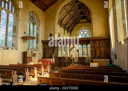 Interior of St Helen's Church with benches, nave and rood screen in Ranworth, Norfolk, England. Stock Photo