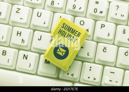 Writing displaying text Summer Holiday, Conceptual photo special period of time in summer for relaxation and fun Typing Cooking Lesson Guidebook, Rety Stock Photo