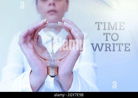 Conceptual display Time To Write, Word Written on to record something or to express an idea in paper or book Lady in outfit holding lamp with two hand Stock Photo