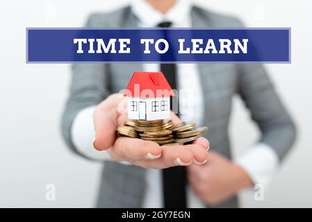 Conceptual caption Time To Learn, Business concept the need to get knowledge or understanding of facts and ideas Real Estate Agent Selling New Propert Stock Photo