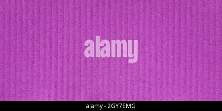 pink corrugated cardboard texture useful as a background Stock Photo