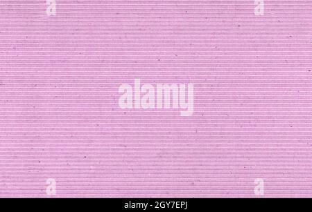 pink corrugated cardboard texture useful as a background Stock Photo