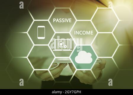 Conceptual display Passive Income, Word Written on earnings extracted from rental property, and other enterprises Inspirational business technology co Stock Photo