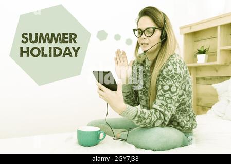 Writing displaying text Summer Holiday, Concept meaning special period of time in summer for relaxation and fun Entrepreneur Checking And Reading Emai Stock Photo