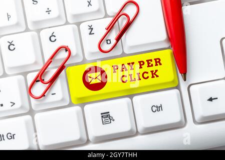 Text showing inspiration Pay Per Click, Business idea internet marketing in which payment is based on clickthroughs Typing Online Network Protocols, C Stock Photo