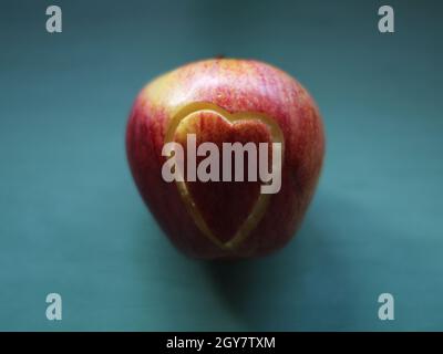 Red apple heart love natural healthy nutritious delicious tasty Stock Photo