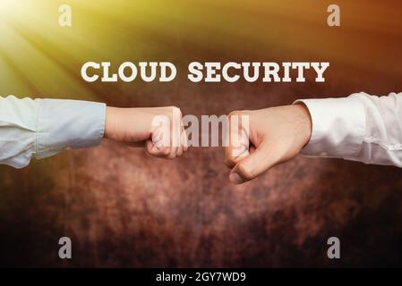 Handwriting text Cloud Security, Word Written on Imposing a secured system of existing data in the Internet Two Professional Well-Dressed Corporate Bu Stock Photo