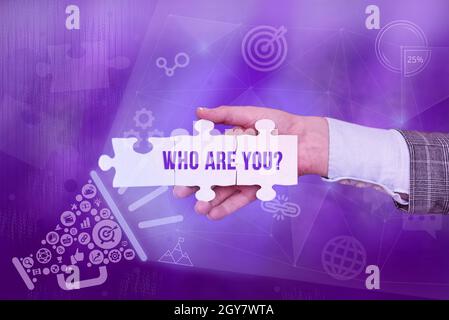Text caption presenting Who Are You Question, Business concept asking an individual identity or an individualal information Inspirational business tec Stock Photo