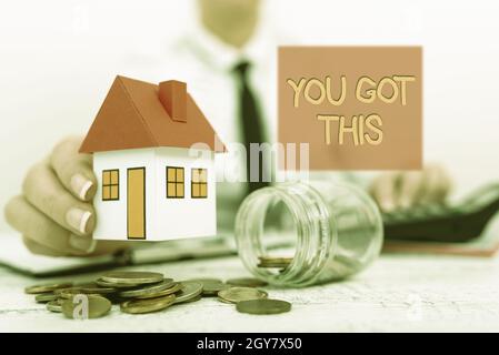 Conceptual caption You Got This, Word for to encourage someone to succeed in dealing with something New home installments and investments plans repres Stock Photo