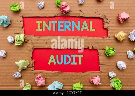 Hand writing sign Internal Audit, Business idea evaluates the objective assurance to improve a firm s is operation Forming New Thoughts Uncover Fresh Stock Photo