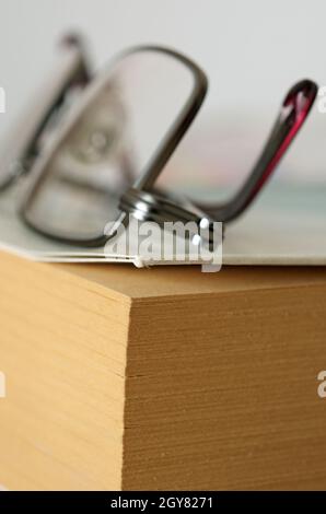 glasses on book Stock Photo