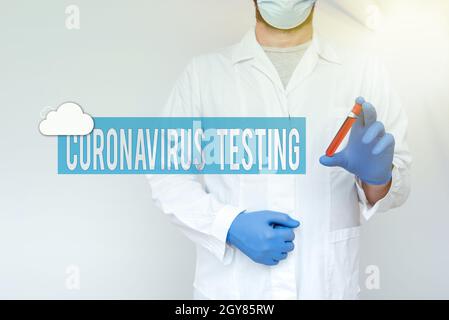 Sign displaying Coronavirus Testing, Business concept Collection of samples from a viable patient to identify SARSCoV2 Chemist Presenting Blood Sample Stock Photo