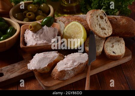 Taramosalata Greek spread Paste (pate) made of ground fish, shrimps, and caviar, served with lemon. Fish Egg Paste Tarama (white and rose), popular Is Stock Photo