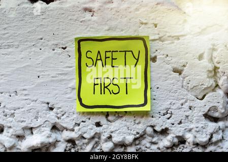 Handwriting text Safety First, Conceptual photo Avoid any unnecessary risk Live Safely Be Careful Pay attention Thinking New Bright Ideas Renewing Cre Stock Photo