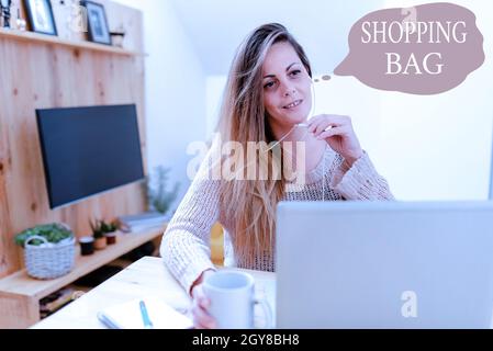 Writing displaying text Shopping Bag, Word Written on Containers for carrying an individualal possessions or purchases Abstract Watching Online Movies Stock Photo