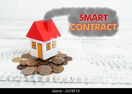 Writing displaying text Smart Contract, Business approach digital agreement to control the transfer of digital currencies Allocating Savings To Buy Ne Stock Photo