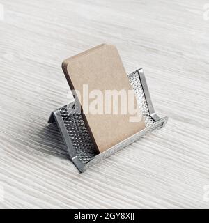 Photo of blank kraft business cards and card holder. Placing your design. Stock Photo