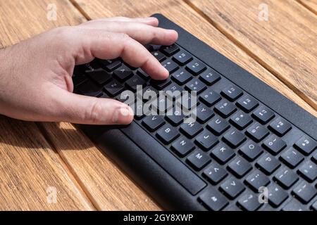 Hands Pointing Pressing Computer Keyboard Keys Typewriting New Ideas. Stock Photo