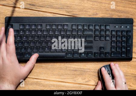 Hands Pointing Pressing Computer Keyboard Keys Typewriting New Ideas. Stock Photo