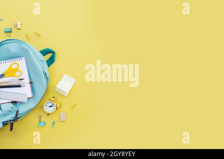 Back to school conceptual flat lay with different office supply items and copy space area for text. Concept for primary and secondary school pupil. Pu Stock Photo