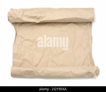 rolled roll of brown crumpled paper on white background, copy space Stock Photo