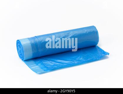 blue plastic trash bags with strings on white background, close up Stock Photo