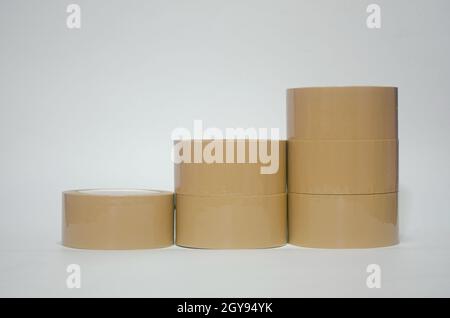 Brown tape on white background. Used for closing parcel boxes. Stock Photo