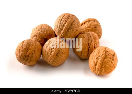 Whole walnuts isolated on white background. Stock Photo