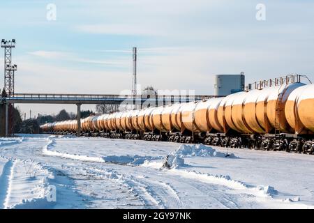 Set of old tanks with oil and fuel transport by rail in winter Stock Photo