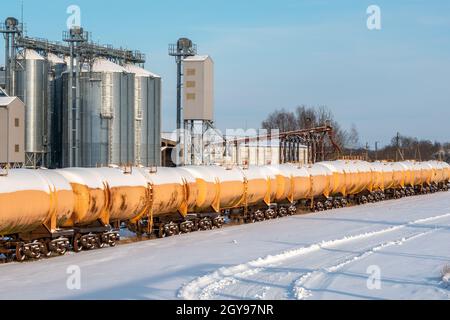 Set of old tanks with oil and fuel transport by rail in winter Stock Photo